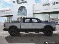 Dominate every road and task in this robust 2021 Ram 1500 Rebel Crew Cab Pickup. Dressed in striking... (image 6)