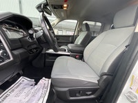 The 2022 Ram 1500 Classic Express, presented in a pristine white finish, is equipped with a robust 4... (image 9)