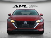 The 2024 Nissan Sentra SV CVT is a stunning red, front-wheel-drive sedan that promises to deliver a... (image 2)