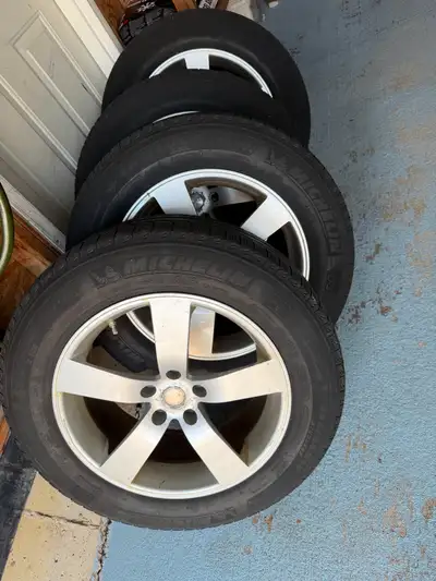 4 Winter MICHELIN tires with Alloy Rims. Size 235/65 R18 5X114.3 bolt pattern 66.1 mm center bore. I...