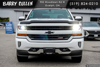 The 2018 Chevrolet Silverado 1500 LT in white offers the perfect balance of robust power and refined... (image 9)