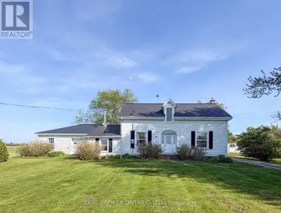 Set on just over an acre along a paved country road east of Frankville, this classic 2-storey countr...