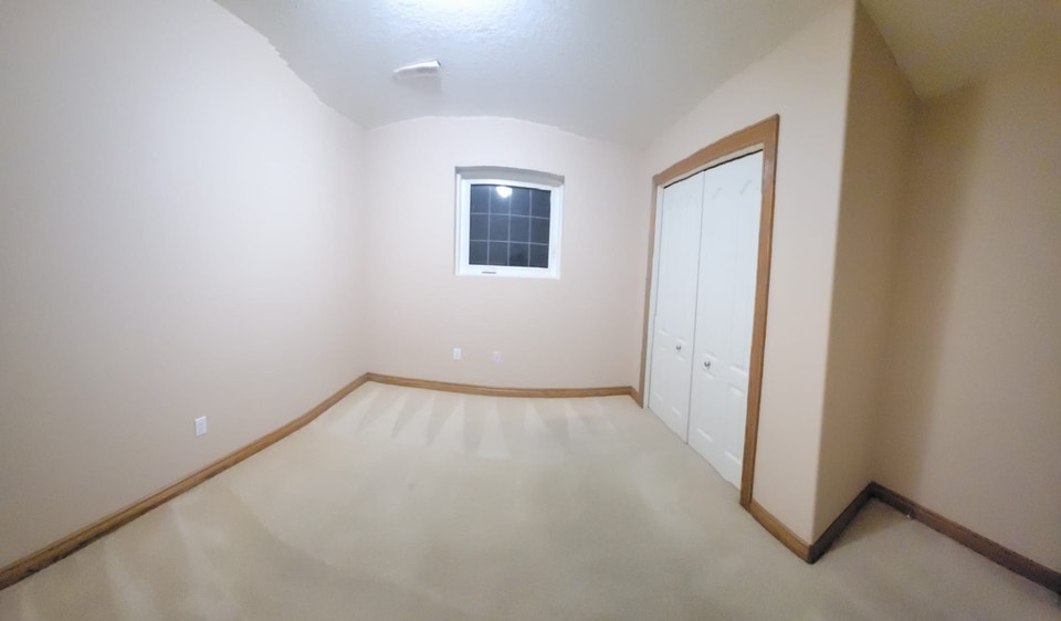Bright & Spacious 3-Bedroom Legal Walkout Suite in Arbour Lake 4