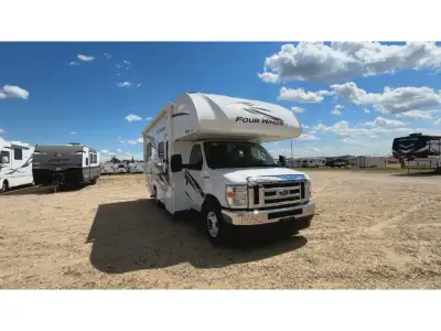 Thor Motor Coach Four Winds Class C gas motorhome 22E highlights: Queen Bed Cab Over Bunk 40in.in. T...