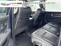 Experience the robust power and commanding presence of the 2012 Ram 3500 Laramie with its stunning d... (image 7)