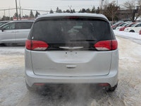 The 2026 Chrysler Grand Caravan SXT in Silver Mist with a Black interior combines versatility, comfo... (image 4)