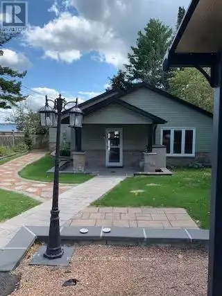 Experience the best of waterfront living in this beautiful 4-bedroom, 3.5-bathroom bungalow offering...