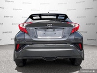 Experience the efficiency and style of this 2022 Toyota C-HR, a compact SUV designed for city drivin... (image 5)