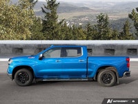 Command the road and conquer any task with this robust Blue 2024 Chevrolet Silverado 1500 LTZ. Equip... (image 1)