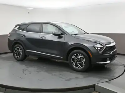 One owner just trade and fully KIA Certified this Sportage LX features a complete power convenience...