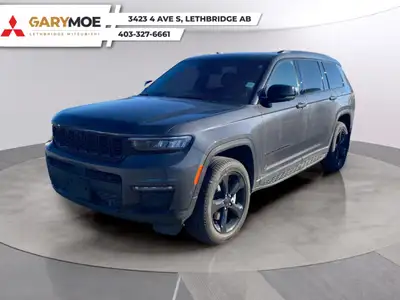 Experience the ultimate blend of style and capability with the 2025 Gray Jeep Grand Cherokee L Limit...