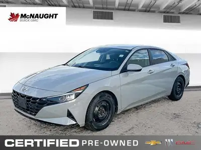 Experience modern styling and efficient performance with the *2021 Hyundai Elantra*, featuring *65,9...