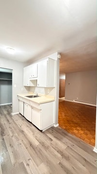 Large 2 Bedroom Unit is available immediately on top floor. All utilities are Inclusive. It will be... (image 6)