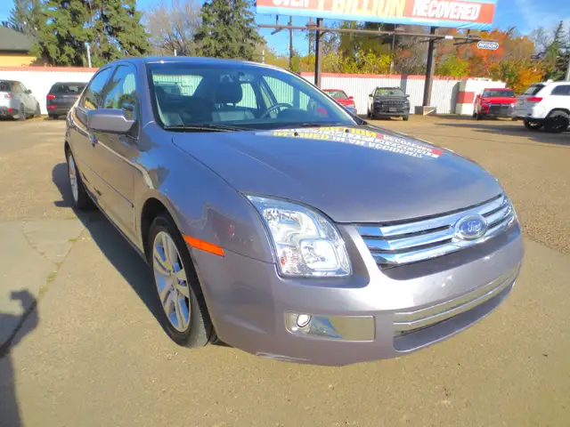 2007 Ford Fusion SEL V6 AWD | Htd Lthr/Roof/AUX ~ Only 61k ~ Car