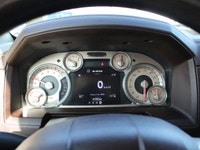 This 2014 Ram 3500 Longhorn is a local trade-in with two keys and lom km's, under the hood sits the... (image 4)