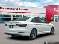 Embrace a more connected and efficient journey with the 2019 Volkswagen Jetta Highline, designed to... (image 6)