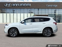 Wrapped in a stunning Quartz White, this 2022 Hyundai Santa Fe Ultimate Calligraphy offers a journey... (image 1)