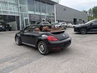 La Volkswagen Beetle 2016 est une voiture compacte emblématique qui allie le style légendaire de la... (image 9)