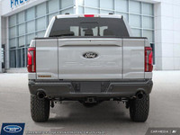 **WE WILL BEAT ANY FORD DEALER IN THE CITY** The 2025 F-150 is purpose-built from the ground up ---... (image 5)
