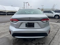 This 2022 Toyota Corolla LE is ready for action from every angle. Sleek J-shaped bi-beam LED headlam... (image 2)