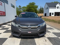 A modern compact sedan with upgraded convenience features, efficient performance, and a comfortable... (image 1)