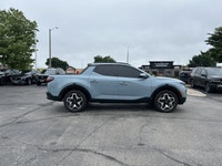 This 2024 Hyundai Santa Cruz Trend boasts a powerful turbocharged engine and stylish Blue Stone exte... (image 3)