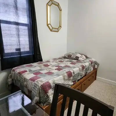 Two furnished rooms for rent in a renovated 4-bedroom character house at 1397 Winnipeg Ave W, in Win...