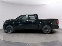 Introducing the 2026 Ram 1500 Sport in an alluring black finish, coupled with a dynamic 4x4 drivetra... (image 1)