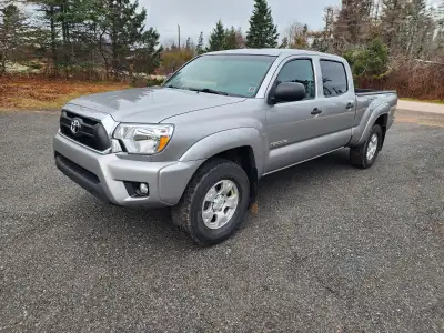 2015 Tacoma SR5 4X4, double cab, V6, auto, rebuilt registration, professionally repaired by shop in...