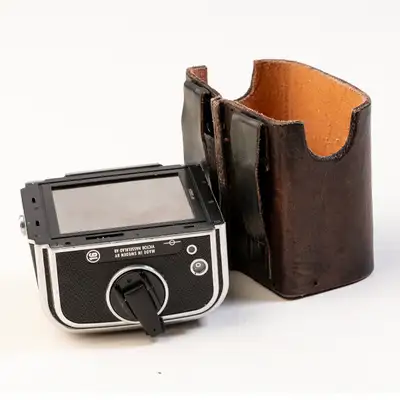 Hand made leather 120 220 film magazine holder for you belt. If needed to ship, I use Canada post an...