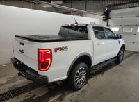 Engineered for reliability and powerful performance, this commanding White 2021 Ford Ranger Crew Cab... (image 3)