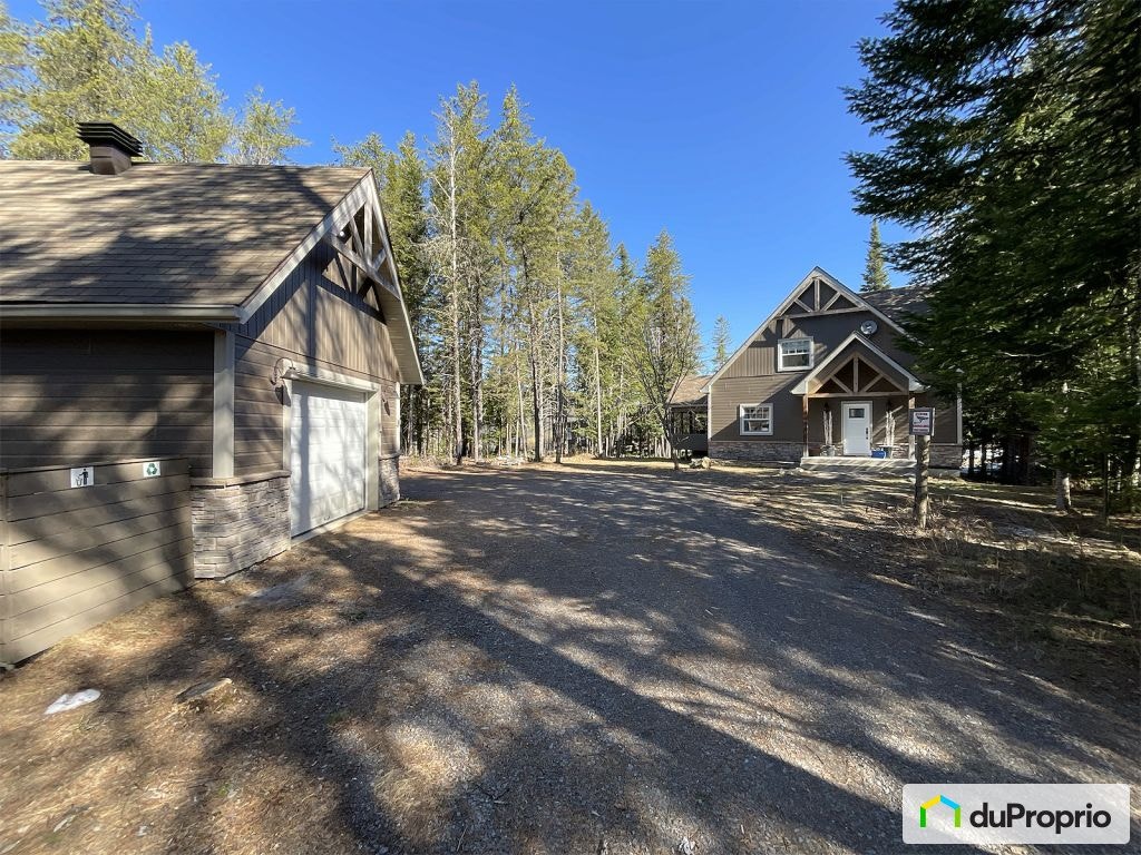 $769,000 - Cottage for sale in St-Côme — photo 1