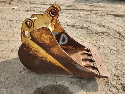 Dig bucket with smooth edge welded onto teeth, Located in our Lloydminster, Ab sales yard.