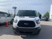 Focused on utility and economy, this Ford Transit is a strong contender in the work van market. This... (image 1)