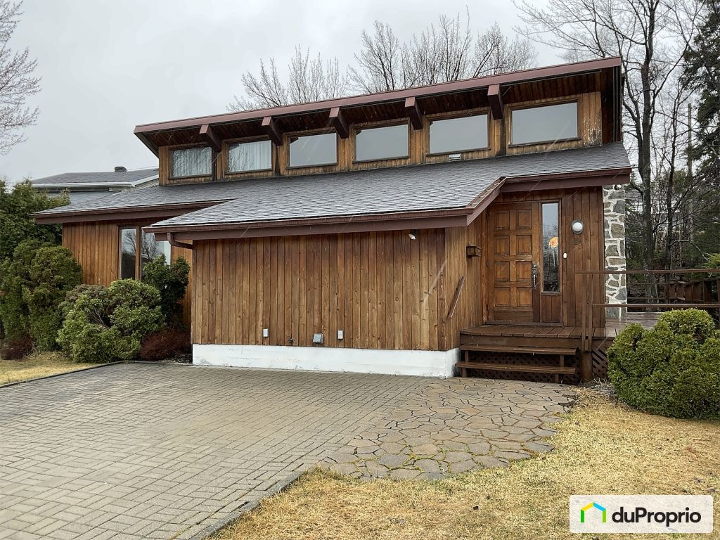 $450,000 - Bungalow for sale in Chicoutimi (Chicoutimi) — photo 1