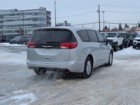 The 2026 Chrysler Grand Caravan SXT in Silver Mist with a Black interior combines versatility, comfo... (image 6)