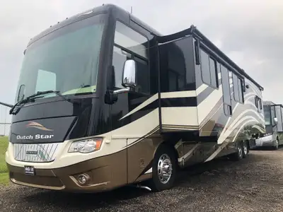 The 2013 Dutch Star 4018 Newmar’s premium craftsmanship Luxury Motorcoach. A spacious bath‑and‑a‑hal...
