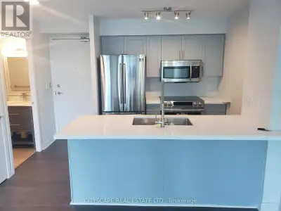 Welcome to Suite 81 Navy Wharf Court, a bright and beautifully maintained 1 Bedroom + Den residence...