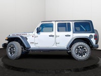 This Jeep Wrangler has a strong ERC 3.6L Pentastar(TM) VVT V6 engine w/ESS engine powering this Auto... (image 1)