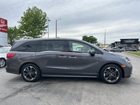 Engineered for memorable family journeys, this 2024 Honda Odyssey Touring in sophisticated Modern St... (image 3)