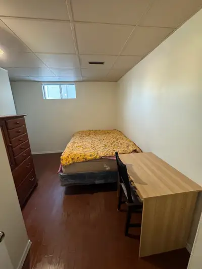 The bedroom is in basement suit with separate entrance, share sitting room, washroom, kitchen, laund...