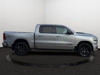 This 2026 RAM 1500 SPORT CREW CAB 4X4 has the following options Leather / Vinyl Bucket Seats, Remote... (image 5)