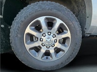 Introducing the powerful 2023 Ram 3500 Limited Longhorn in a eye-catching silver color, boasting a 4... (image 9)