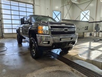 Welcome to Sherwood Buick GMC! Aftermarket 6 Rough Country Lift Kit/Fender Flares/S&B Intake/Headach... (image 2)