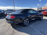 Trade In Vehicle**Ford**Mustang**V6**3.7L**Automatic**Convertible**Back Up Camera**Bluetooth**Paddle... (image 1)