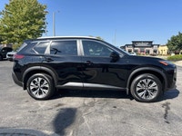 Slide into this sleek 2022 Nissan Rogue SV, boasting a Super Black exterior and a surprisingly spaci... (image 3)