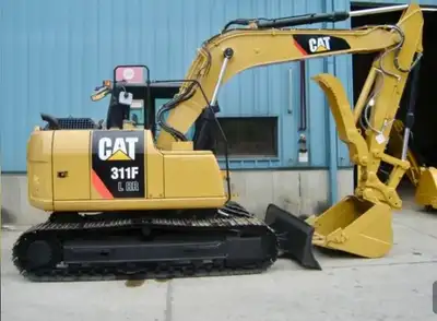 2015 Cat 311F with all the bells and whistles. BLADE, HYDRAULIC THUMB, HYDRAULIC COUPLER, 6000 hours...