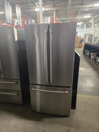 Café Energy Star 18.6 cu. ft. counter-depth french-door refrigerator with internal water dispenser....