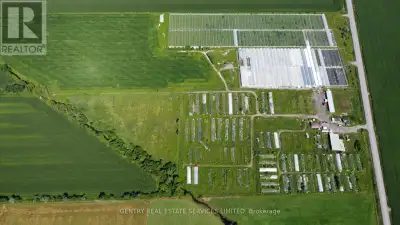 99.39 Acre farm improved with several outbuildings and approximately 500,000 square feet of "interio...