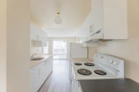 Amenities: Upgraded Kitchens • In-suite Laundry • Dishwasher Suite & Building: Two level, three-bedr... (image 1)